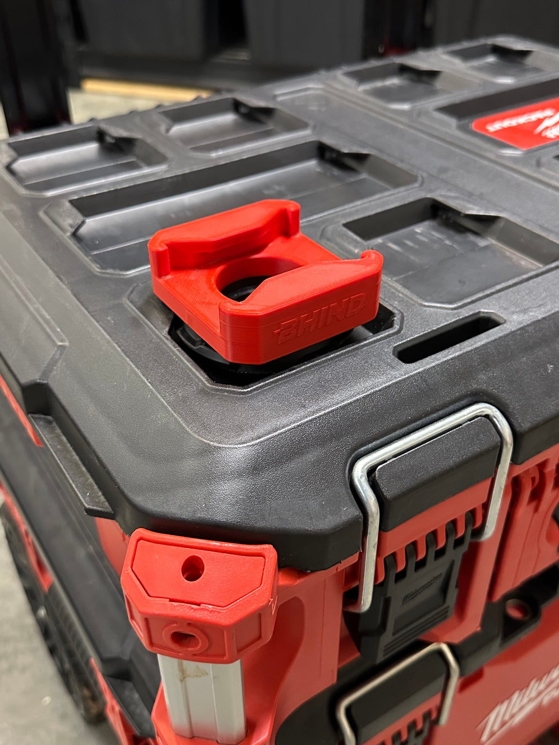 BHIND HUB quarter-turn interface mounted on a compatible Milwaukee PACKOUT surface