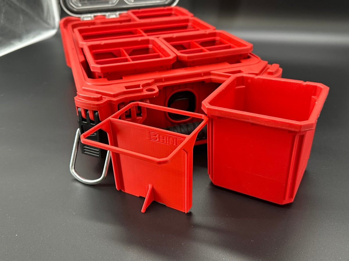 Close-up of red BHIND SB2 divider beside an original Milwaukee PACKOUT small bin